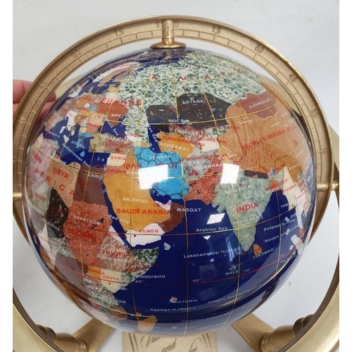 206A - 220mm gemstone globe in rotating cradle, with four sculptured legs and central compass