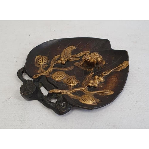 223 - Oriental-style bronzed lily with relief gilded decoration of frog and fruiting vines, 11.5cm wide