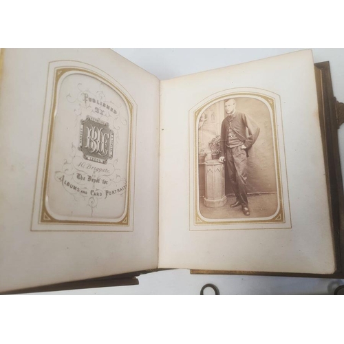 233 - Victorian photograph album enclosing various Victorian portraits, two other Victorian photograph alb... 