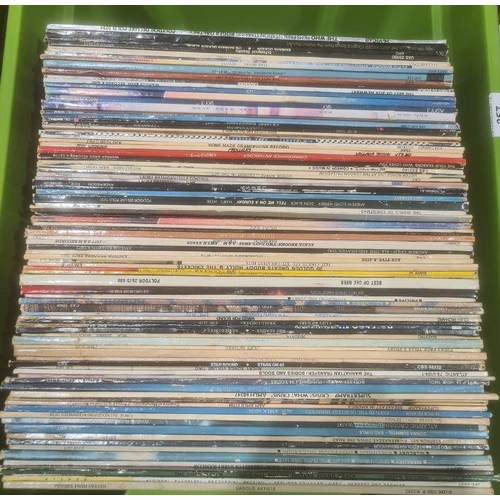 257 - Approximately 100 vinyl records of various genres and artists including Rod Stewart, Cliff Richard, ... 