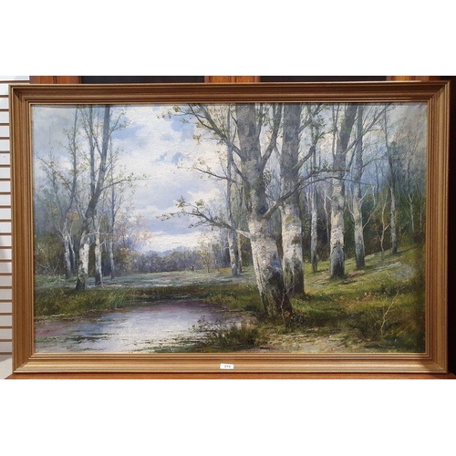 307 - L. Bader - 20th century
 Oil on canvas
 Woodland view with lake in the foreground, signed lower righ... 