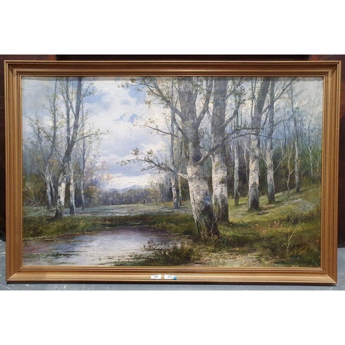 307 - L. Bader - 20th century
 Oil on canvas
 Woodland view with lake in the foreground, signed lower righ... 