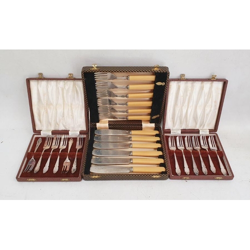 335 - A quantity of silver plate to include cased flatware, two-handled tray, stainless steel knives, teap... 