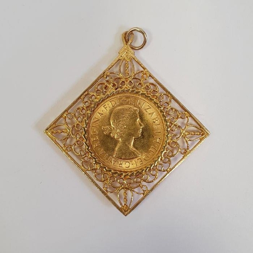 411 - 1966 gold sovereign mounted a yellow metal pendant, diamond shaped