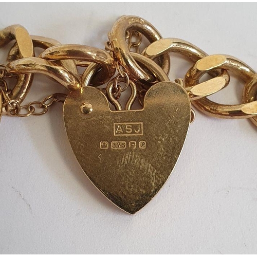 441 - 9ct gold padlock charm bracelet with eight gold coloured charms, 20g in total approx.