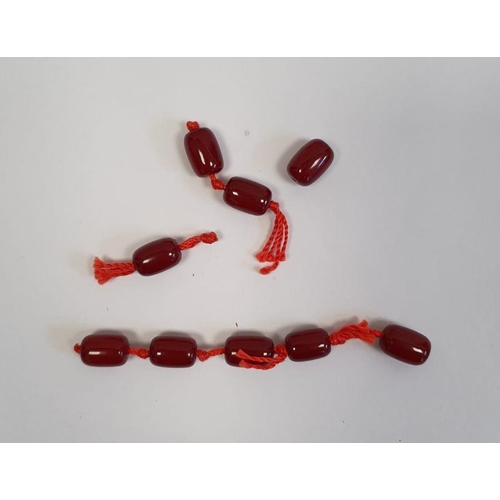 484 - Red amber bead necklace, graduated and nine loose beads, gross weight approx. 110g