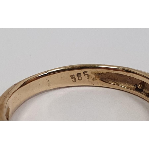 490 - Gold ring set with seven small diamonds in rubover setting, marked 585, finger size P1/2, approx. we... 