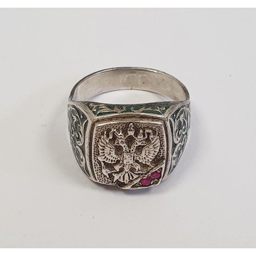 497 - Russian white metal green enamel and pink stone ring, the square top with double-headed eagle presse... 