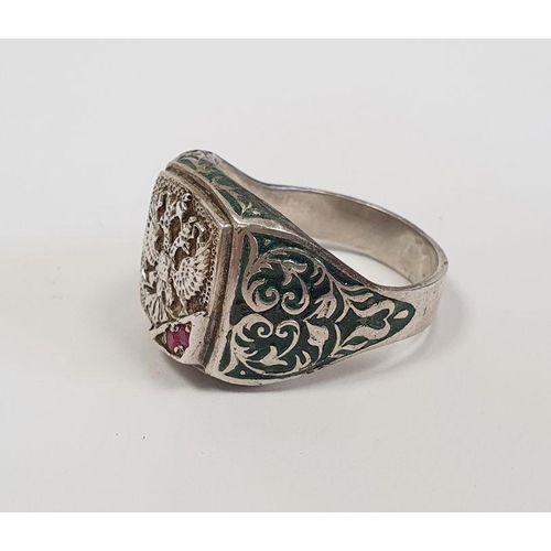 497 - Russian white metal green enamel and pink stone ring, the square top with double-headed eagle presse... 