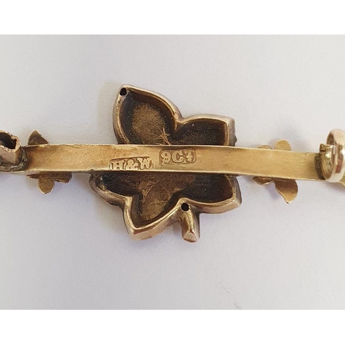 499 - Gold horseshoe pendant by Saunders & Shepherd, marked 9, a gold bar brooch engraved 'Ruth', marked 9... 