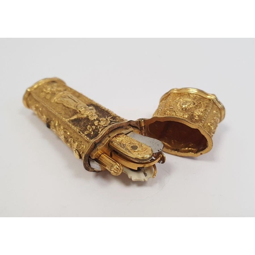 520 - A 19th century gilt metal etui, tapering octagonal shaped, relief decorated with flowers and figures... 