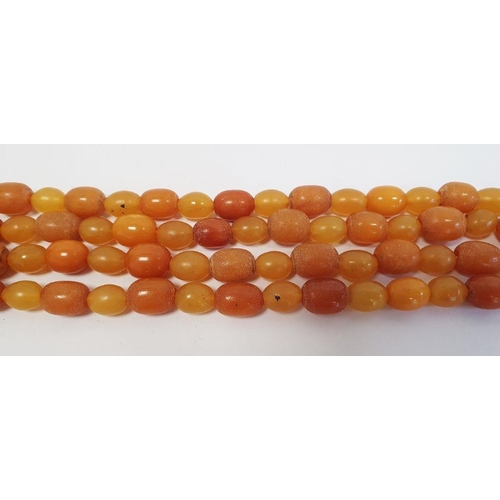 522 - An amber graduating beaded necklace, 32g approx. 75cm long approx.