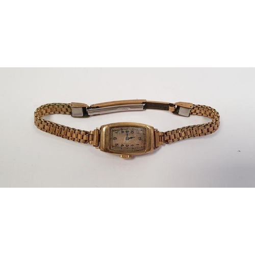 586 - Lady's 1920's/30's 9ct gold Rolex wristwatch with convex sided oblong dial and the rolled gold flexi... 