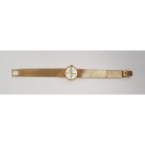 589 - Lady's 18ct gold Omega wristwatch with circular dial, baton numerals, integral flexible mesh strap (... 