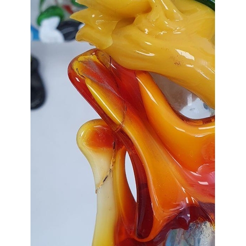 70 - Large Murano glass clown playing an instrument, with orange bow tie and blue hat, 43cm high, another... 