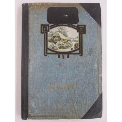 123 - Album of early 20th century postcards and greetings cards and a scrapbook of postcards, various loca... 