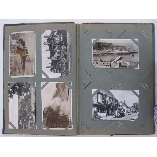 123 - Album of early 20th century postcards and greetings cards and a scrapbook of postcards, various loca... 