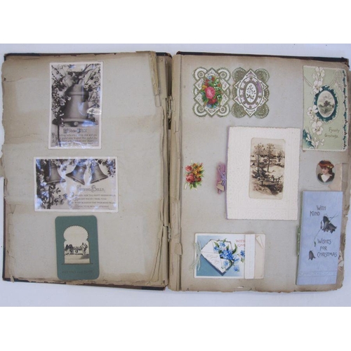 127A - Early 20th century scrapbook containing greetings seasons cards, postcards