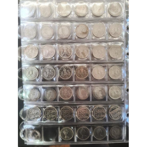 153 - Two albums of coins including silver shillings, sixpences, together with commemoratives