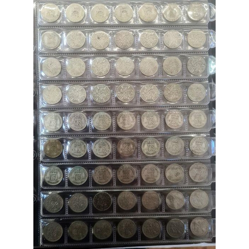 153 - Two albums of coins including silver shillings, sixpences, together with commemoratives