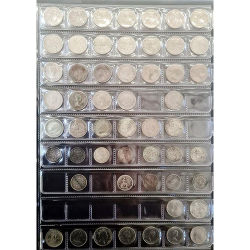 153 - Two albums of coins including silver shillings, sixpences, together with commemoratives