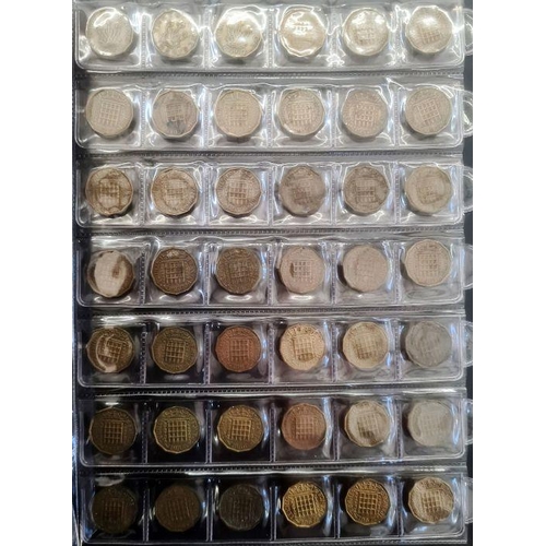 153 - Two albums of coins including silver shillings, sixpences, together with commemoratives