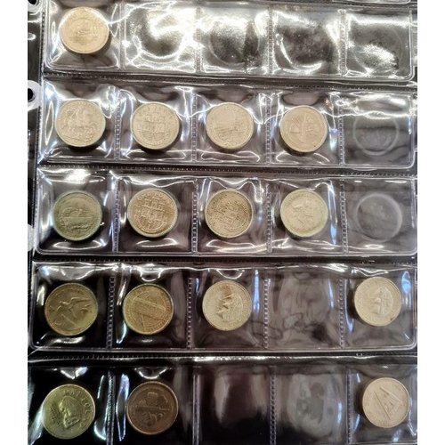 153 - Two albums of coins including silver shillings, sixpences, together with commemoratives