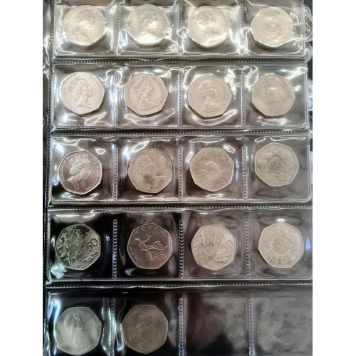 153 - Two albums of coins including silver shillings, sixpences, together with commemoratives