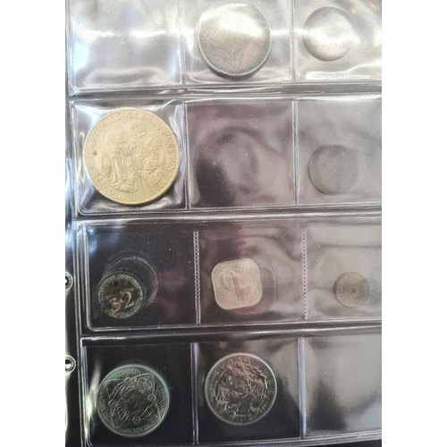 153 - Two albums of coins including silver shillings, sixpences, together with commemoratives