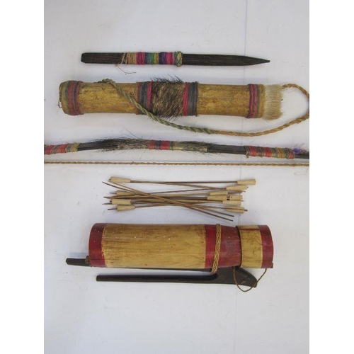 16 - Bow, quiver and arrows in a bamboo case and a wooden pointed tool