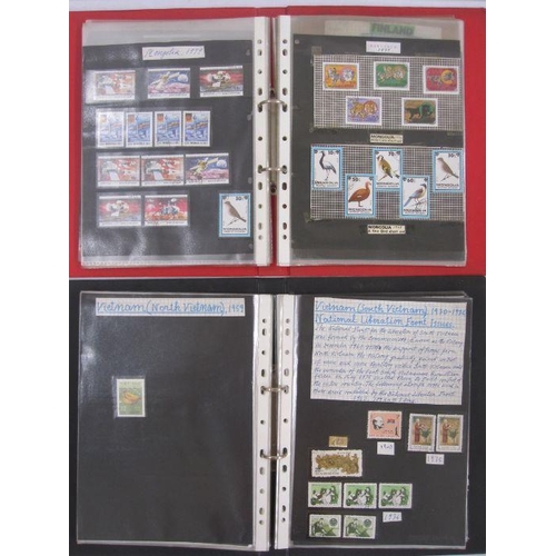 32 - 12 albums/folders with a few low value stamps, includes a printed album for UN stamps (no stamps) (1... 