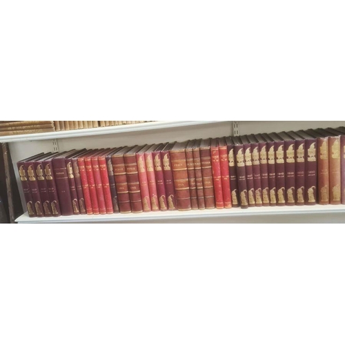 390 - Complete run of Punch magazine, mainly red bindings with gilt and blindstamped decorations to front ... 