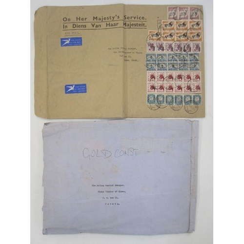 58 - Box with two albums with envelopes with mostly commonwealth loose stamps on pieces, many thousands, ... 