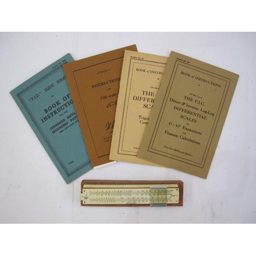 77 - Slide rule, cased, with four instruction manuals 'For the use of the P.I.C direct and inverse log-lo... 