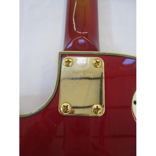 98 - Columbus Les Paul-style electric guitar in red and orange, in fitted case