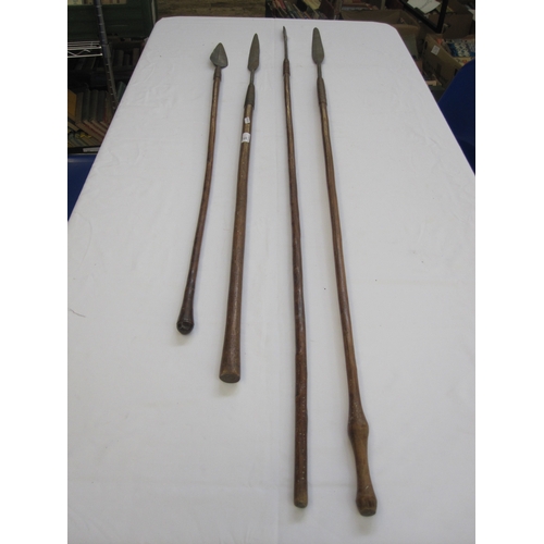 15 - Four assorted spears with wooden handles (4)