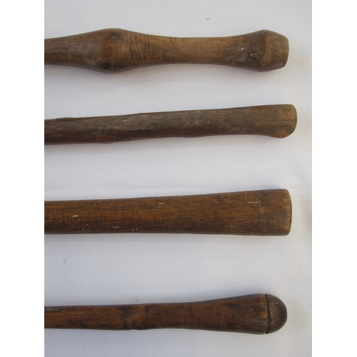 15 - Four assorted spears with wooden handles (4)