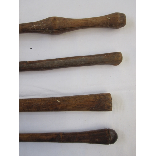 15 - Four assorted spears with wooden handles (4)