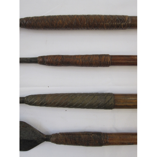 15 - Four assorted spears with wooden handles (4)