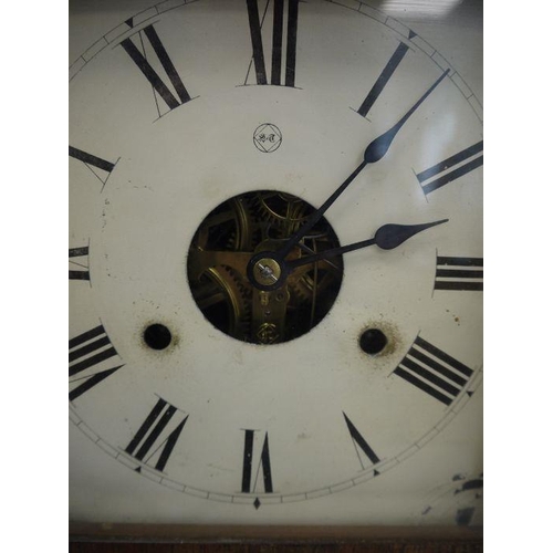 1053 - Rosewood American-style wall clock with Roman numerals, printed ice-skaters decoration to glass pane... 