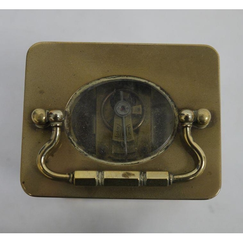 1063 - Brass and glass-cased carriage clock with handle