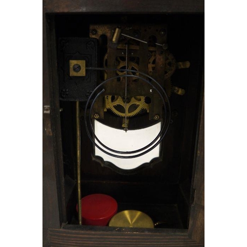 1066 - Early 20th century mahogany bracket clock with Roman numerals to the steel dial, on plinth base