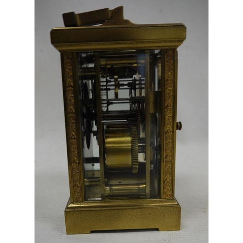 1083 - Late 19th century glass and brass carriage clock with Arabic numerals to the dial, marked 'Hamilton ... 