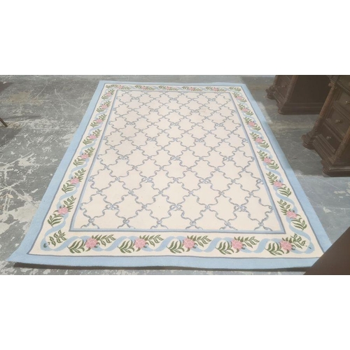 1096 - Three modern rugs, cream ground with blue ribbon trellis decoration, various sizes