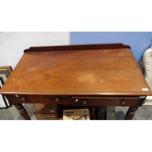 1132 - Early 20th century walnut washstand, the rectangular top with moulded edge, above two drawers, on tu... 