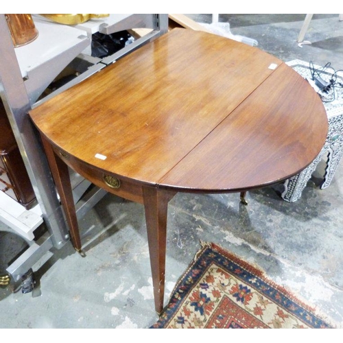 1136 - 19th century mahogany drop-leaf table on square section tapering supports to brass caps and castors