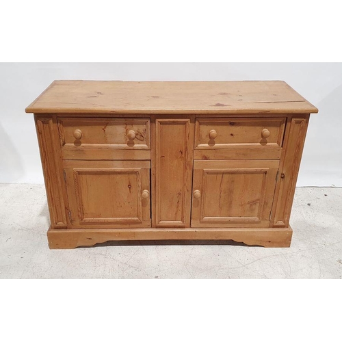 1197 - 20th century pine sideboard, the rectangular top above two drawers, two cupboard doors, on bracket f... 