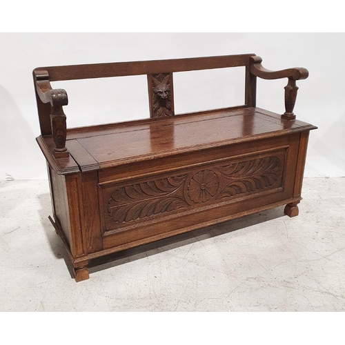 1231 - 20th century oak monk's-type bench with carved decoration to the front, 118cm x 74cm