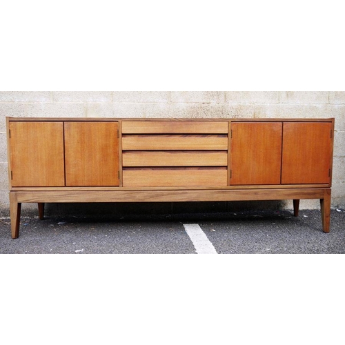 1315 - 20th century modern teak sideboard in the Danish - style, with four central drawers flanked by pair ... 