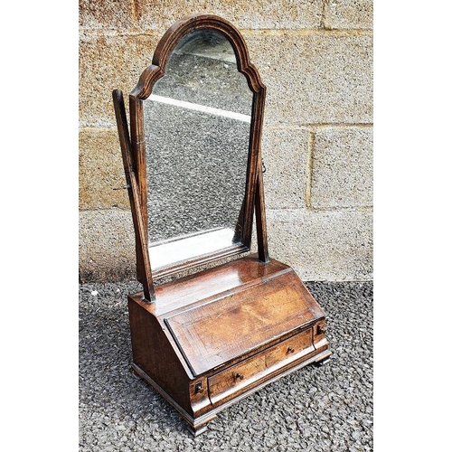 1394 - Early 18th century style walnut and banded dressing table mirror, the arched-top mirror on box base ... 